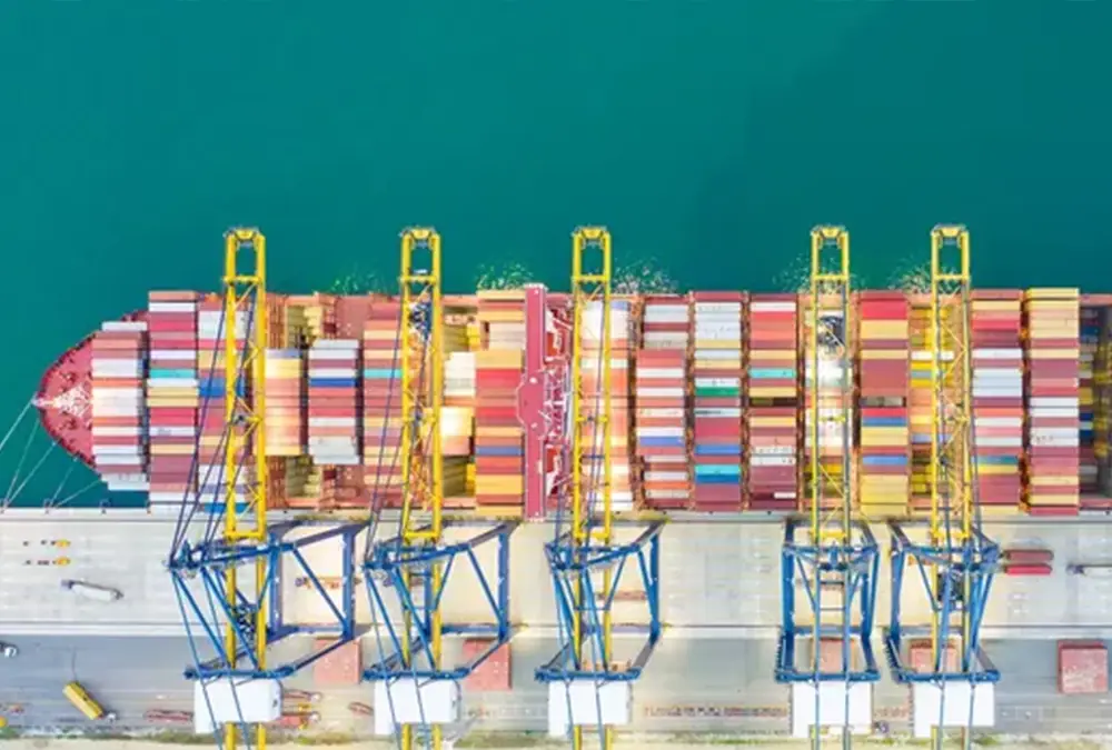Birds eye view of a shipping container being unloaded